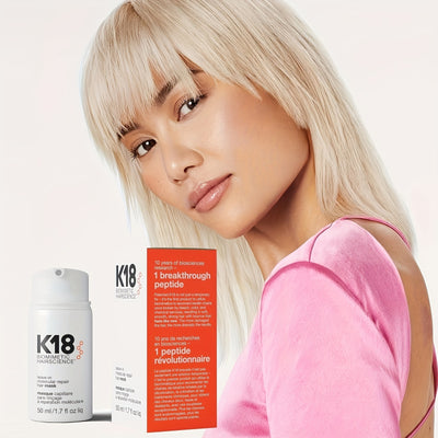 Model with sleek blonde hair next to K18 Leave-In Molecular Repair Hair Mask 50 ml bottle and box